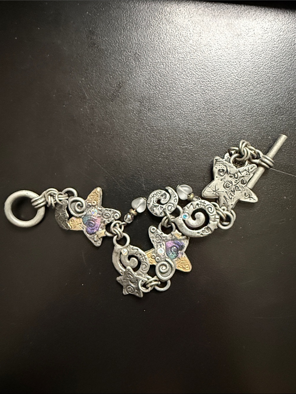 90’s Silver-Tone Star & Swirl Charm Bracelet with Multicolor Accents Narelle